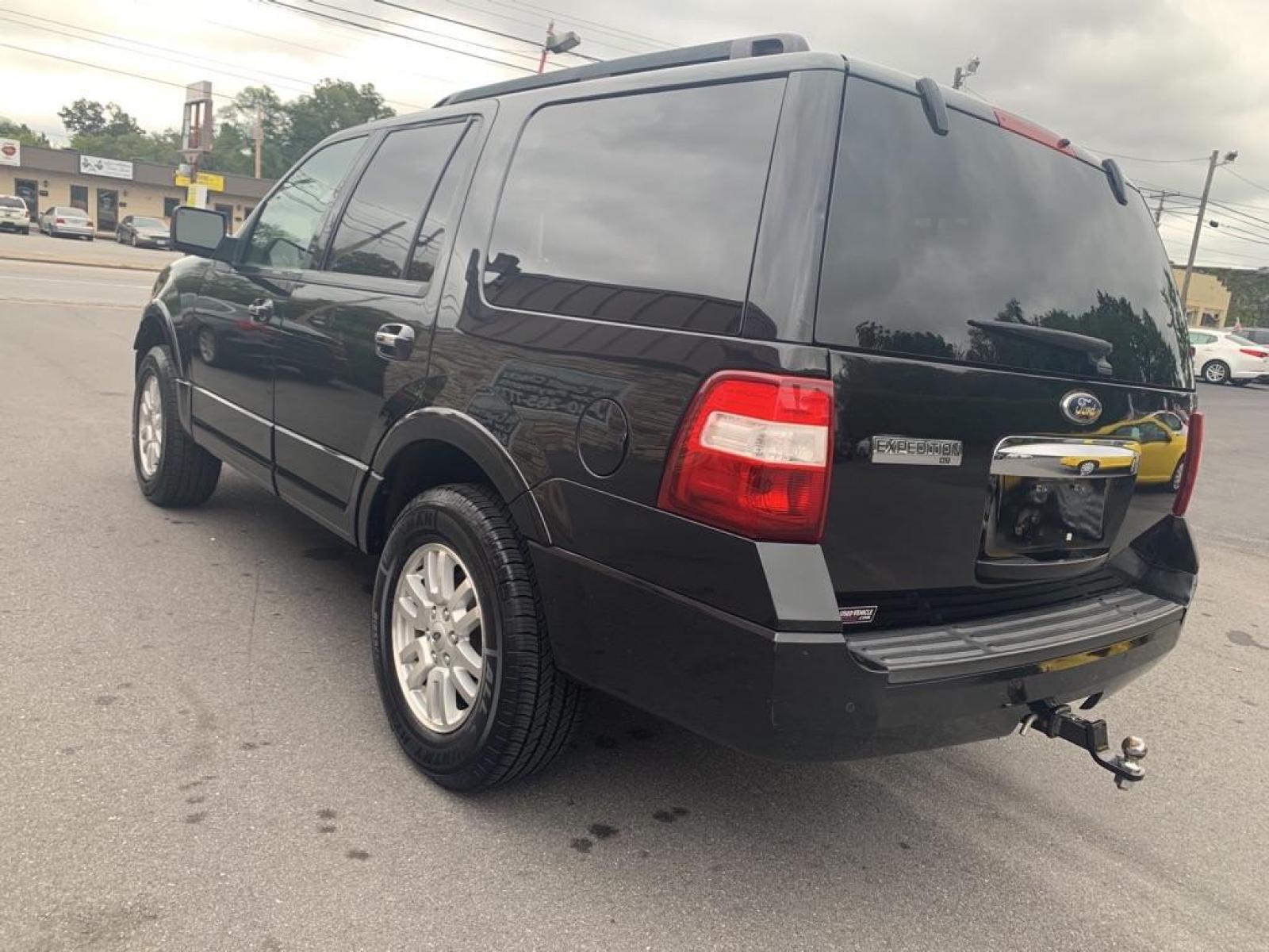 2011 BLACK FORD EXPEDITION XLT (1FMJU1J5XBE) with an 5.4L engine, Automatic transmission, located at 2514 Williamson Rd NE, Roanoke, VA, 24012, (540) 265-7770, 37.294636, -79.936249 - Photo #2