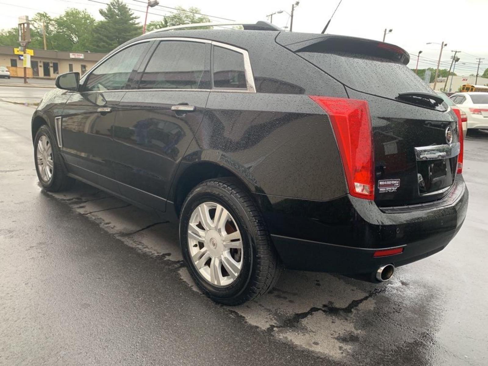 2013 BLACK CADILLAC SRX LUXURY COLLECTION (3GYFNCE3XDS) with an 3.6L engine, Automatic transmission, located at 2514 Williamson Rd NE, Roanoke, VA, 24012, (540) 265-7770, 37.294636, -79.936249 - Photo #1