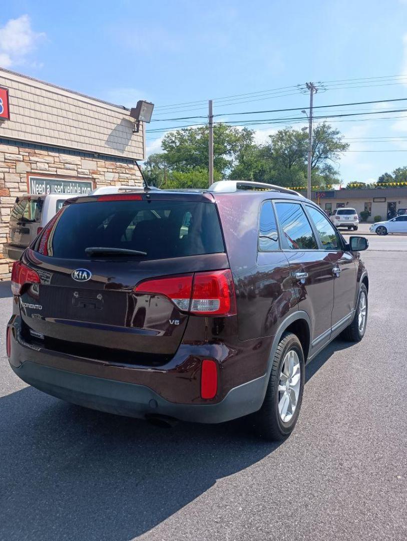 2015 MAROON KIA SORENTO LX (5XYKTDA7XFG) with an 3.3L engine, Automatic transmission, located at 2514 Williamson Rd NE, Roanoke, VA, 24012, (540) 265-7770, 37.294636, -79.936249 - NO CREDIT CHECK FINANCING WITH ONLY $2500 DOWN PAYMENT!!!! Check out our website www.needausedvehicle.com for our No Credit Check/ In House Financing options!! No Credit Check Available!!! In House Financing Available!!! All Clean Title Vehicles (no Salvaged or flooded vehicles ever on our lot)! - Photo#3