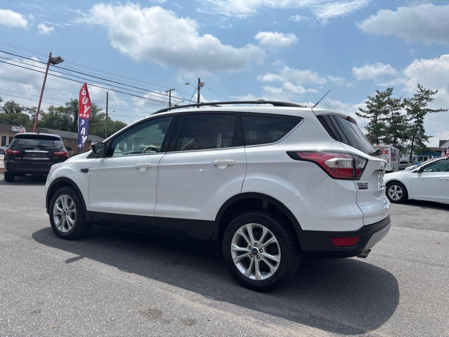 2017 WHITE FORD ESCAPE SE (1FMCU9GD4HU) with an 1.5L engine, Automatic transmission, located at 2514 Williamson Rd NE, Roanoke, VA, 24012, (540) 265-7770, 37.294636, -79.936249 - NO CREDIT CHECK FINANCING WITH ONLY $1900 DOWN PAYMENT!!!! Check out our website www.needausedvehicle.com for our No Credit Check/ In House Financing options!! No Credit Check Available!!! In House Financing Available!!! All Clean Title Vehicles (no Salvaged or flooded vehicles ever on our lot)!- Photo#2