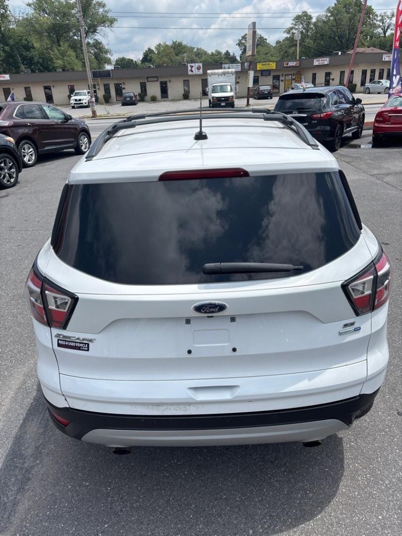 2017 WHITE FORD ESCAPE SE (1FMCU9GD4HU) with an 1.5L engine, Automatic transmission, located at 2514 Williamson Rd NE, Roanoke, VA, 24012, (540) 265-7770, 37.294636, -79.936249 - NO CREDIT CHECK FINANCING WITH ONLY $1900 DOWN PAYMENT!!!! Check out our website www.needausedvehicle.com for our No Credit Check/ In House Financing options!! No Credit Check Available!!! In House Financing Available!!! All Clean Title Vehicles (no Salvaged or flooded vehicles ever on our lot)!- Photo#3