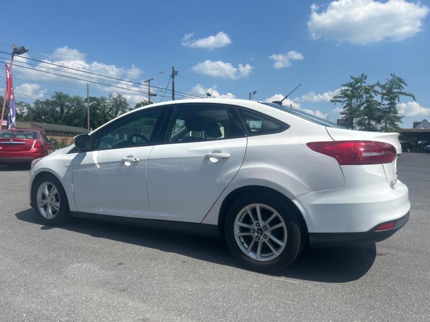 2016 WHITE FORD FOCUS SE (1FADP3F21GL) with an 2.0L engine, Automatic transmission, located at 2514 Williamson Rd NE, Roanoke, VA, 24012, (540) 265-7770, 37.294636, -79.936249 - NO CREDIT CHECK FINANCING WITH ONLY $2200 DOWN PAYMENT!!!! Check out our website www.needausedvehicle.com for our No Credit Check/ In House Financing options!! No Credit Check Available!!! In House Financing Available!!! All Clean Title Vehicles (no Salvaged or flooded vehicles ever on our lot)! - Photo#1