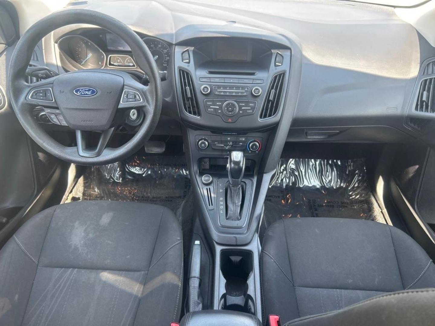 2016 WHITE FORD FOCUS SE (1FADP3F21GL) with an 2.0L engine, Automatic transmission, located at 2514 Williamson Rd NE, Roanoke, VA, 24012, (540) 265-7770, 37.294636, -79.936249 - NO CREDIT CHECK FINANCING WITH ONLY $2200 DOWN PAYMENT!!!! Check out our website www.needausedvehicle.com for our No Credit Check/ In House Financing options!! No Credit Check Available!!! In House Financing Available!!! All Clean Title Vehicles (no Salvaged or flooded vehicles ever on our lot)! - Photo#3