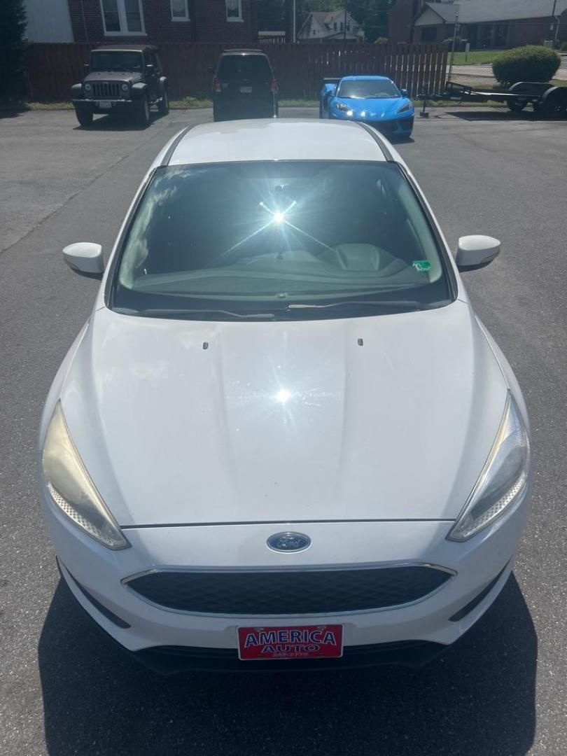 2016 WHITE FORD FOCUS SE (1FADP3F21GL) with an 2.0L engine, Automatic transmission, located at 2514 Williamson Rd NE, Roanoke, VA, 24012, (540) 265-7770, 37.294636, -79.936249 - NO CREDIT CHECK FINANCING WITH ONLY $2200 DOWN PAYMENT!!!! Check out our website www.needausedvehicle.com for our No Credit Check/ In House Financing options!! No Credit Check Available!!! In House Financing Available!!! All Clean Title Vehicles (no Salvaged or flooded vehicles ever on our lot)! - Photo#10