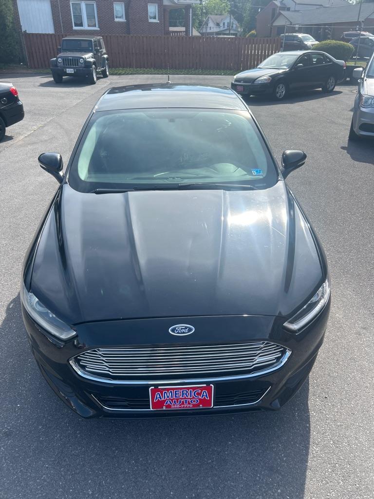 2015 BLACK FORD FUSION SE (3FA6P0H76FR) with an 2.5L engine, Automatic transmission, located at 2514 Williamson Rd NE, Roanoke, VA, 24012, (540) 265-7770, 37.294636, -79.936249 - NO CREDIT CHECK FINANCING WITH ONLY $1700 DOWN PAYMENT!!!! Check out our website www.needausedvehicle.com for our No Credit Check/ In House Financing options!! No Credit Check Available!!! In House Financing Available!!! All Clean Title Vehicles (no Salvaged or flooded vehicles ever on our lot)! - Photo#2
