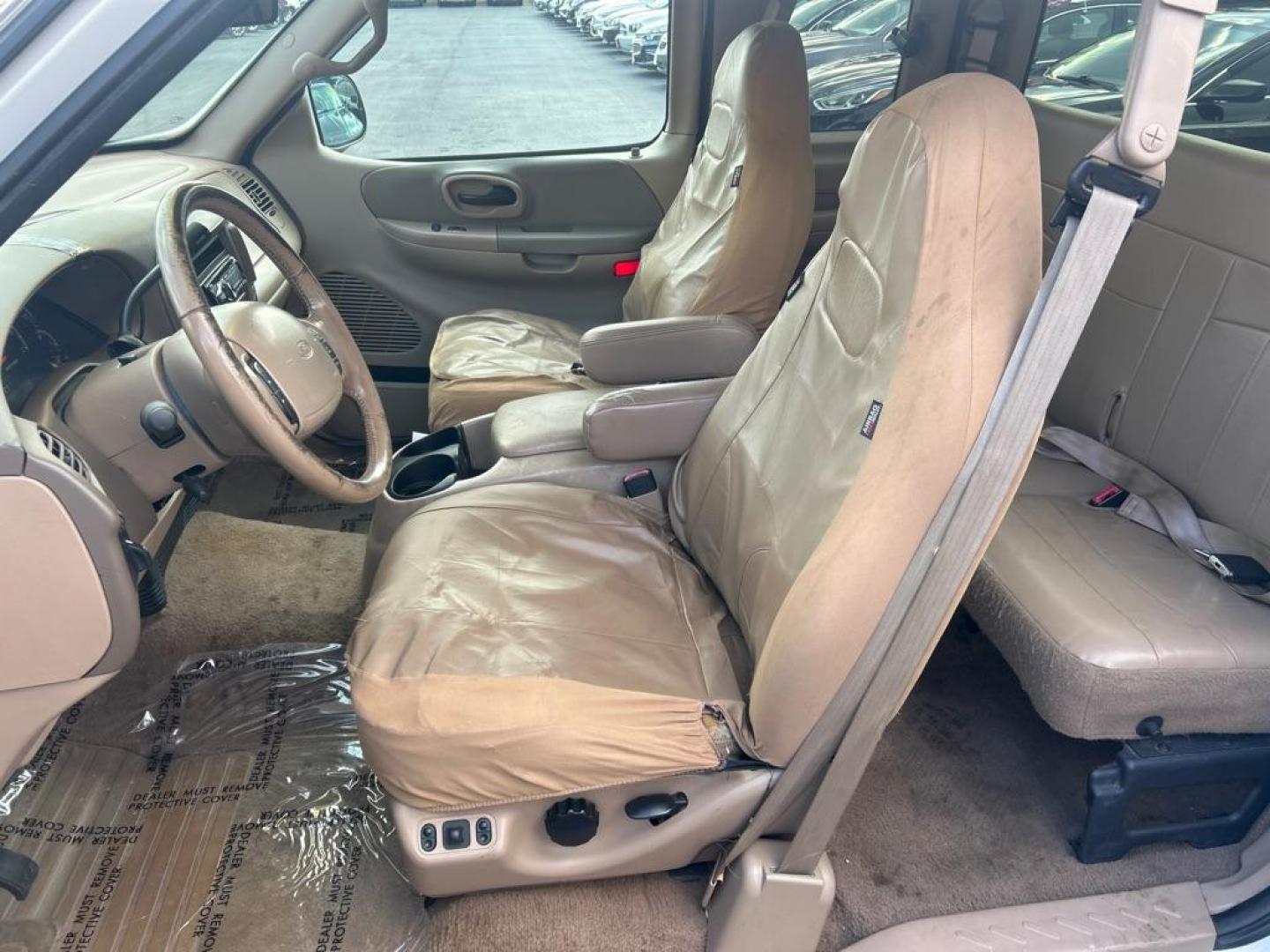 1999 WHITE FORD F150 Lariat (1FTRX17L6XK) with an 5.4L engine, Automatic transmission, located at 2514 Williamson Rd NE, Roanoke, VA, 24012, (540) 265-7770, 37.294636, -79.936249 - NO CREDIT CHECK FINANCING WITH ONLY $1300 DOWN PAYMENT!!!! Check out our website www.needausedvehicle.com for our No Credit Check/ In House Financing options!! No Credit Check Available!!! In House Financing Available!!! All Clean Title Vehicles (no Salvaged or flooded vehicles ever on our lot)! - Photo#6