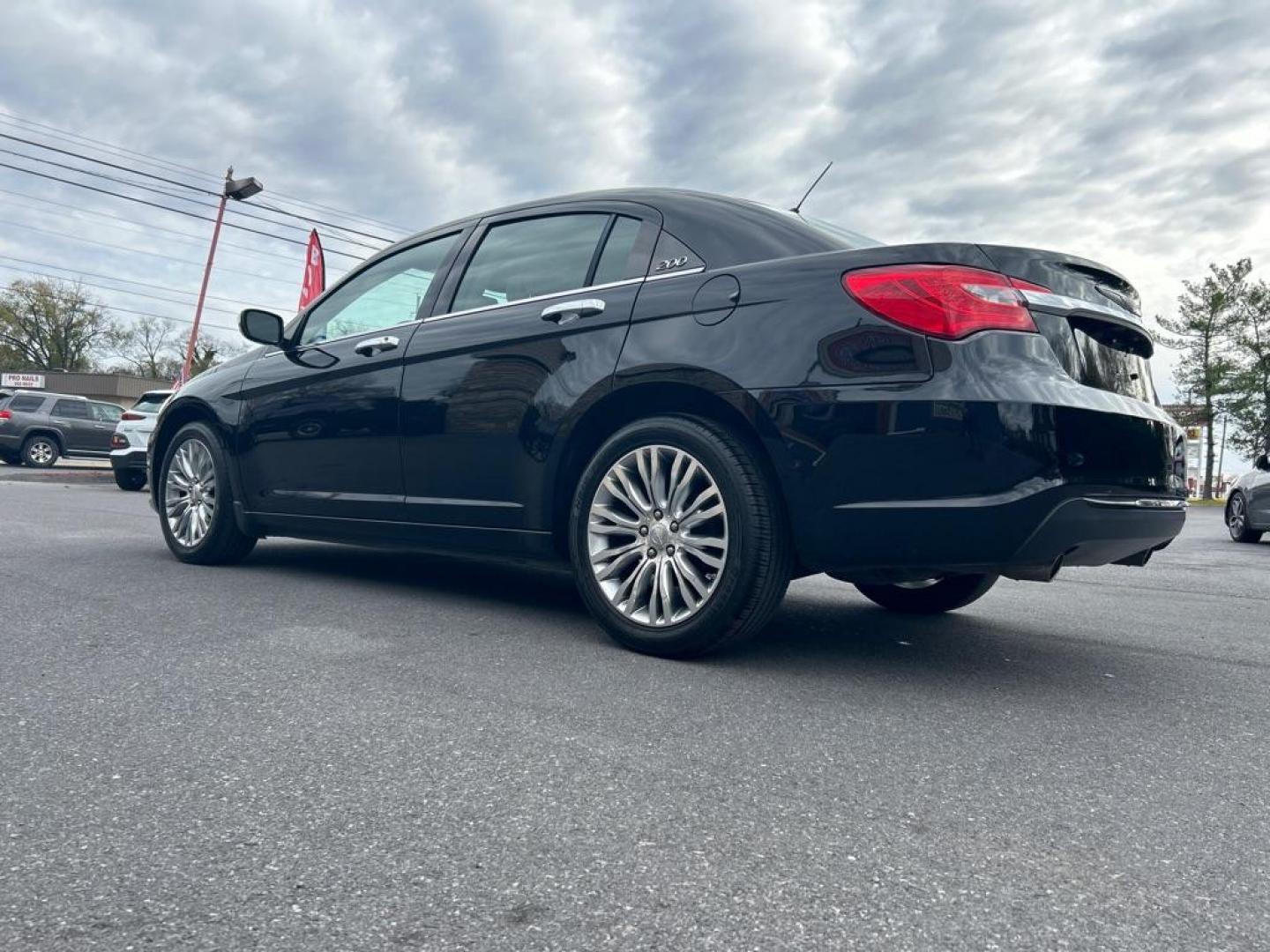 2012 BLACK CHRYSLER 200 LIMITED (1C3CCBCG6CN) with an 3.6L engine, Automatic transmission, located at 2514 Williamson Rd NE, Roanoke, VA, 24012, (540) 265-7770, 37.294636, -79.936249 - Photo#2
