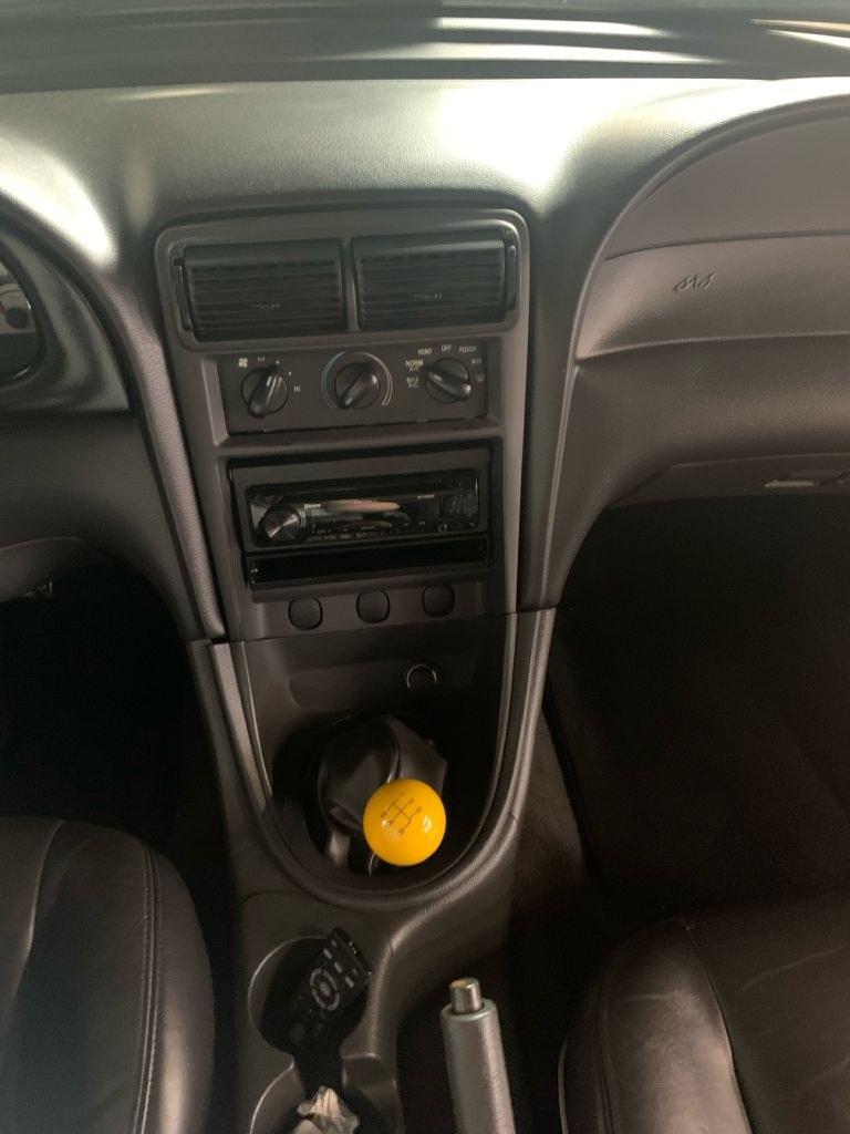 1999 YELLOW FORD MUSTANG GT (1FAFP45X2XF) with an 4.6L engine, 4-Speed Manual transmission, located at 2514 Williamson Rd NE, Roanoke, VA, 24012, (540) 265-7770, 37.294636, -79.936249 - **** CASH ONLY PRICE IS $17000 (NOT INCLUDING SALES TAX, TAGS, TITLING AND PROCESSING FEE) **** ************VEHICLE SHOWN BY APPOINTMENT ONLY********************** This beautiful, well maintained convertible show car is equipped with Kenny Bell Supercharged 4.6 L engine- Photo#7