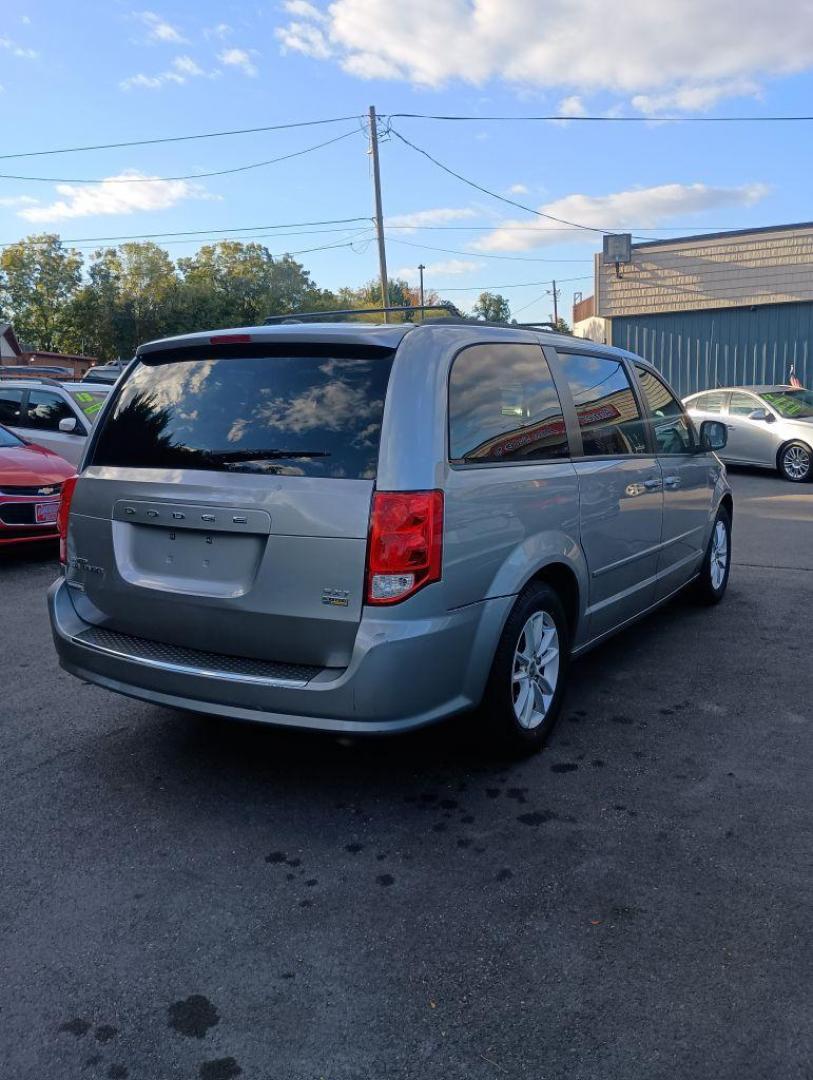 2016 SILVER DODGE GRAND CARAVAN SXT (2C4RDGCG7GR) with an 3.6L engine, Automatic transmission, located at 2514 Williamson Rd NE, Roanoke, VA, 24012, (540) 265-7770, 37.294636, -79.936249 - Photo#2