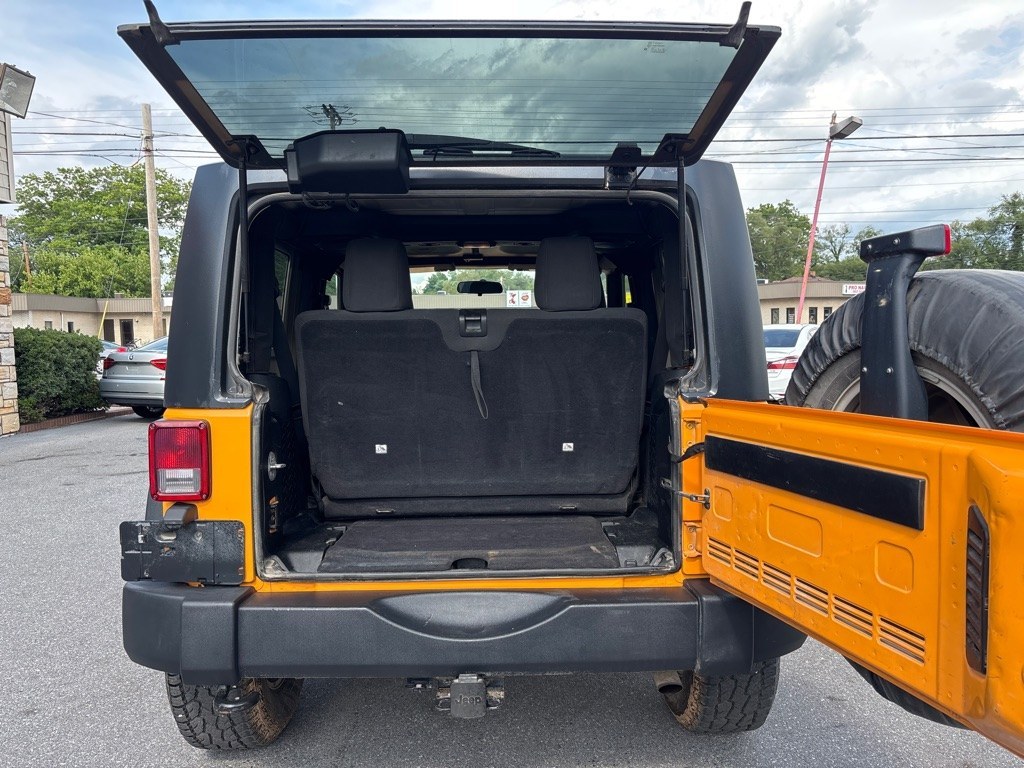 2012 YELLOW JEEP WRANGLER SPORT (1C4AJWAG5CL) with an 3.6L engine, 5-Speed Manual transmission, located at 2514 Williamson Rd NE, Roanoke, VA, 24012, (540) 265-7770, 37.294636, -79.936249 - NO CREDIT CHECK FINANCING WITH ONLY $2800 DOWN PAYMENT!!!! Check out our website www.needausedvehicle.com for our No Credit Check/ In House Financing options!! No Credit Check Available!!! In House Financing Available!!! All Clean Title Vehicles (no Salvaged or flooded vehicles ever on our lot)!- Photo#4