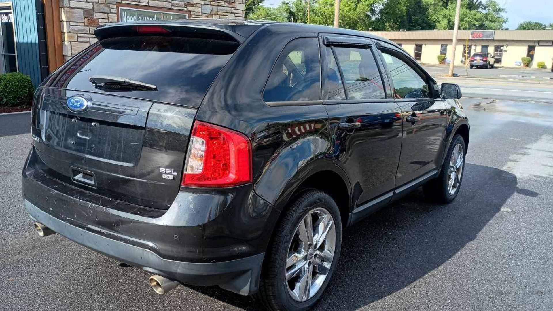 2012 BLACK FORD EDGE SEL (2FMDK4JC8CB) with an 3.5L engine, Automatic transmission, located at 2514 Williamson Rd NE, Roanoke, VA, 24012, (540) 265-7770, 37.294636, -79.936249 - NO CREDIT CHECK FINANCING WITH ONLY $2000 DOWN PAYMENT!!!! Check out our website www.needausedvehicle.com for our No Credit Check/ In House Financing options!! No Credit Check Available!!! In House Financing Available!!! All Clean Title Vehicles (no Salvaged or flooded vehicles ever on our lot)! - Photo#7