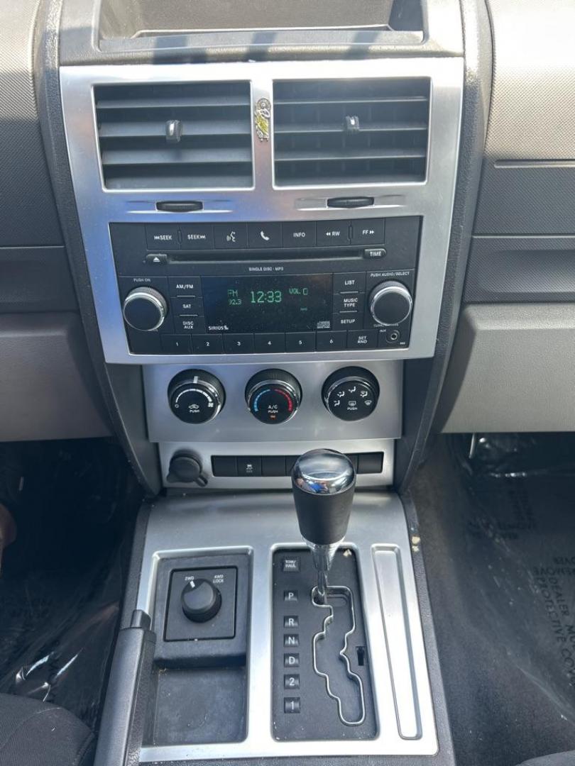 2010 GREEN DODGE NITRO SXT (1D4PU5GK2AW) with an 3.7L engine, Automatic transmission, located at 2514 Williamson Rd NE, Roanoke, VA, 24012, (540) 265-7770, 37.294636, -79.936249- Photo#9