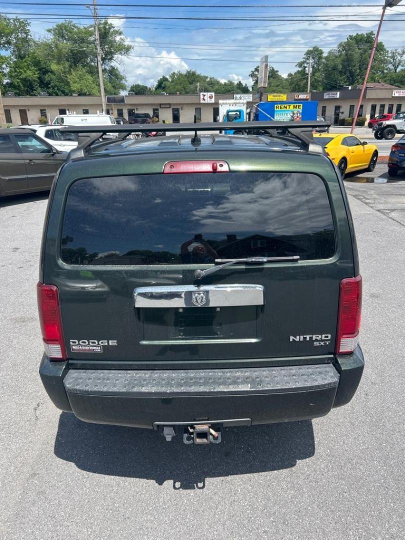 2010 GREEN DODGE NITRO SXT (1D4PU5GK2AW) with an 3.7L engine, Automatic transmission, located at 2514 Williamson Rd NE, Roanoke, VA, 24012, (540) 265-7770, 37.294636, -79.936249- Photo#11