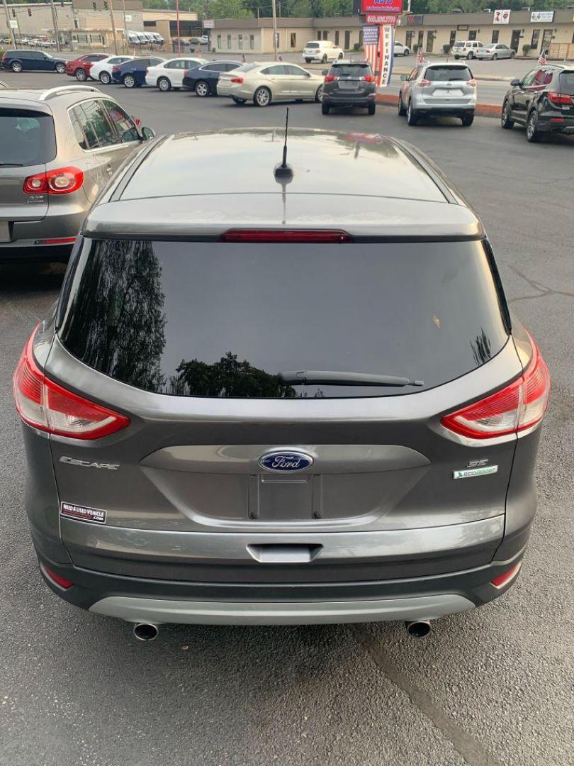 2013 GRAY FORD ESCAPE SE (1FMCU0GX8DU) with an 1.6L engine, Automatic transmission, located at 2514 Williamson Rd NE, Roanoke, VA, 24012, (540) 265-7770, 37.294636, -79.936249 - NO CREDIT CHECK FINANCING WITH ONLY $2300 DOWN PAYMENT!!!! Check out our website www.needausedvehicle.com for our No Credit Check/ In House Financing options!! No Credit Check Available!!! In House Financing Available!!! All Clean Title Vehicles (no Salvaged or flooded vehicles ever on our lot)! - Photo#10