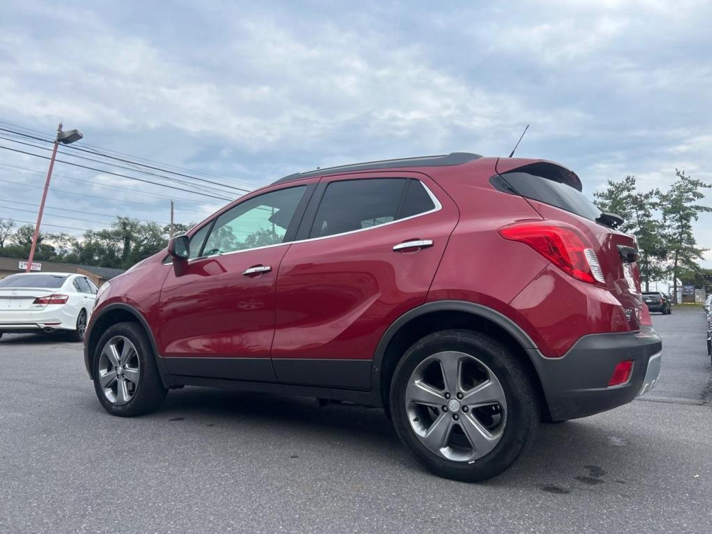 2013 RED BUICK ENCORE (KL4CJESB6DB) with an 1.4L engine, Automatic transmission, located at 2514 Williamson Rd NE, Roanoke, VA, 24012, (540) 265-7770, 37.294636, -79.936249 - Photo#1