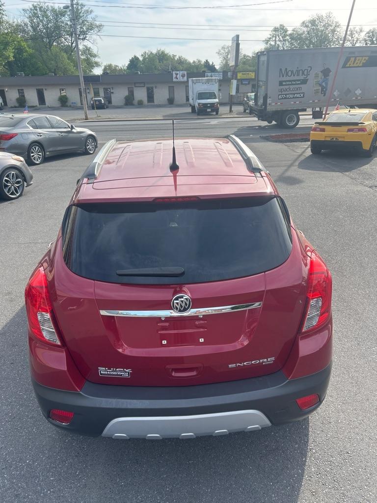 2013 RED BUICK ENCORE LEATHER (KL4CJESB6DB) with an 1.4L engine, Automatic transmission, located at 2514 Williamson Rd NE, Roanoke, VA, 24012, (540) 265-7770, 37.294636, -79.936249 - Photo#11
