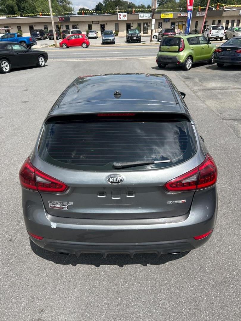 2015 GRAY KIA FORTE SX (KNAFZ5A35F5) with an 1.6L engine, 6-Speed Manual transmission, located at 2514 Williamson Rd NE, Roanoke, VA, 24012, (540) 265-7770, 37.294636, -79.936249 - Photo#10