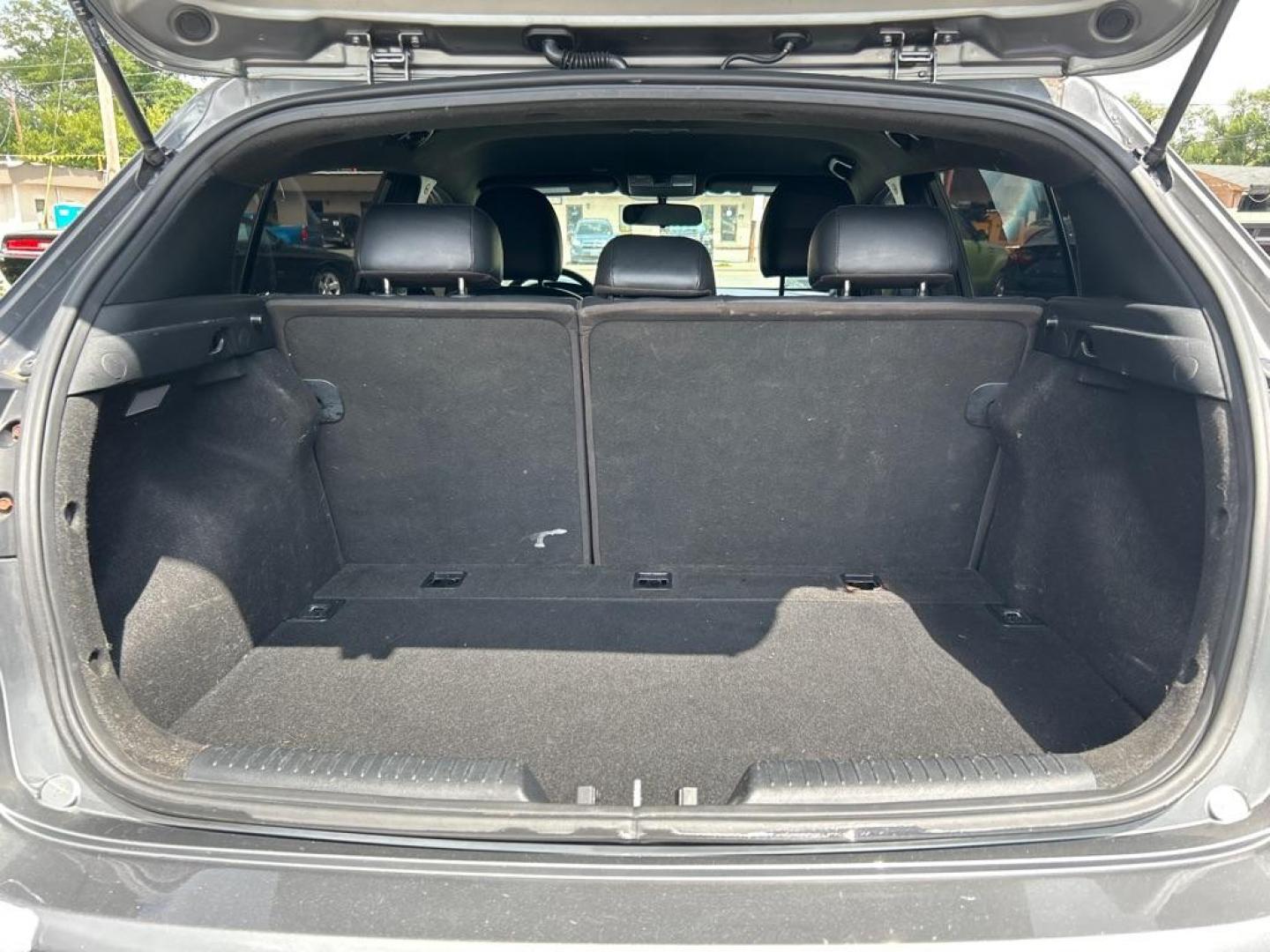 2015 GRAY KIA FORTE SX (KNAFZ5A35F5) with an 1.6L engine, 6-Speed Manual transmission, located at 2514 Williamson Rd NE, Roanoke, VA, 24012, (540) 265-7770, 37.294636, -79.936249 - Photo#12