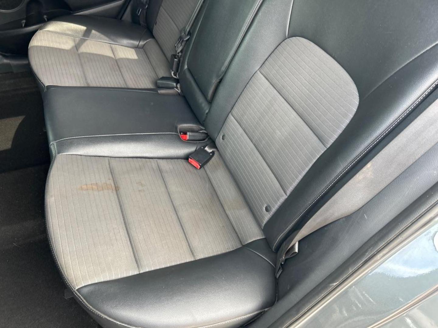 2015 GRAY KIA FORTE SX (KNAFZ5A35F5) with an 1.6L engine, 6-Speed Manual transmission, located at 2514 Williamson Rd NE, Roanoke, VA, 24012, (540) 265-7770, 37.294636, -79.936249 - Photo#16