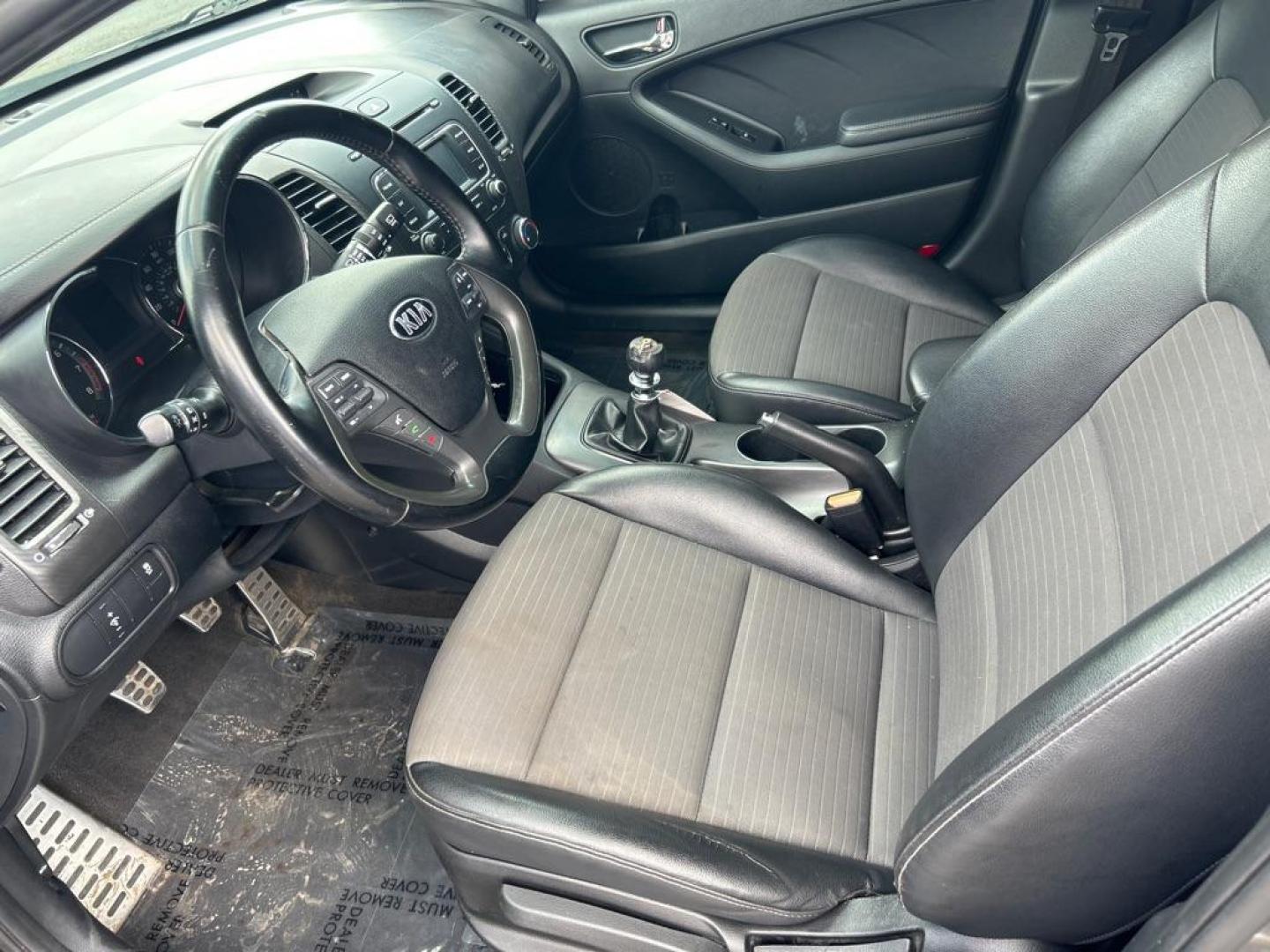 2015 GRAY KIA FORTE SX (KNAFZ5A35F5) with an 1.6L engine, 6-Speed Manual transmission, located at 2514 Williamson Rd NE, Roanoke, VA, 24012, (540) 265-7770, 37.294636, -79.936249 - Photo#20