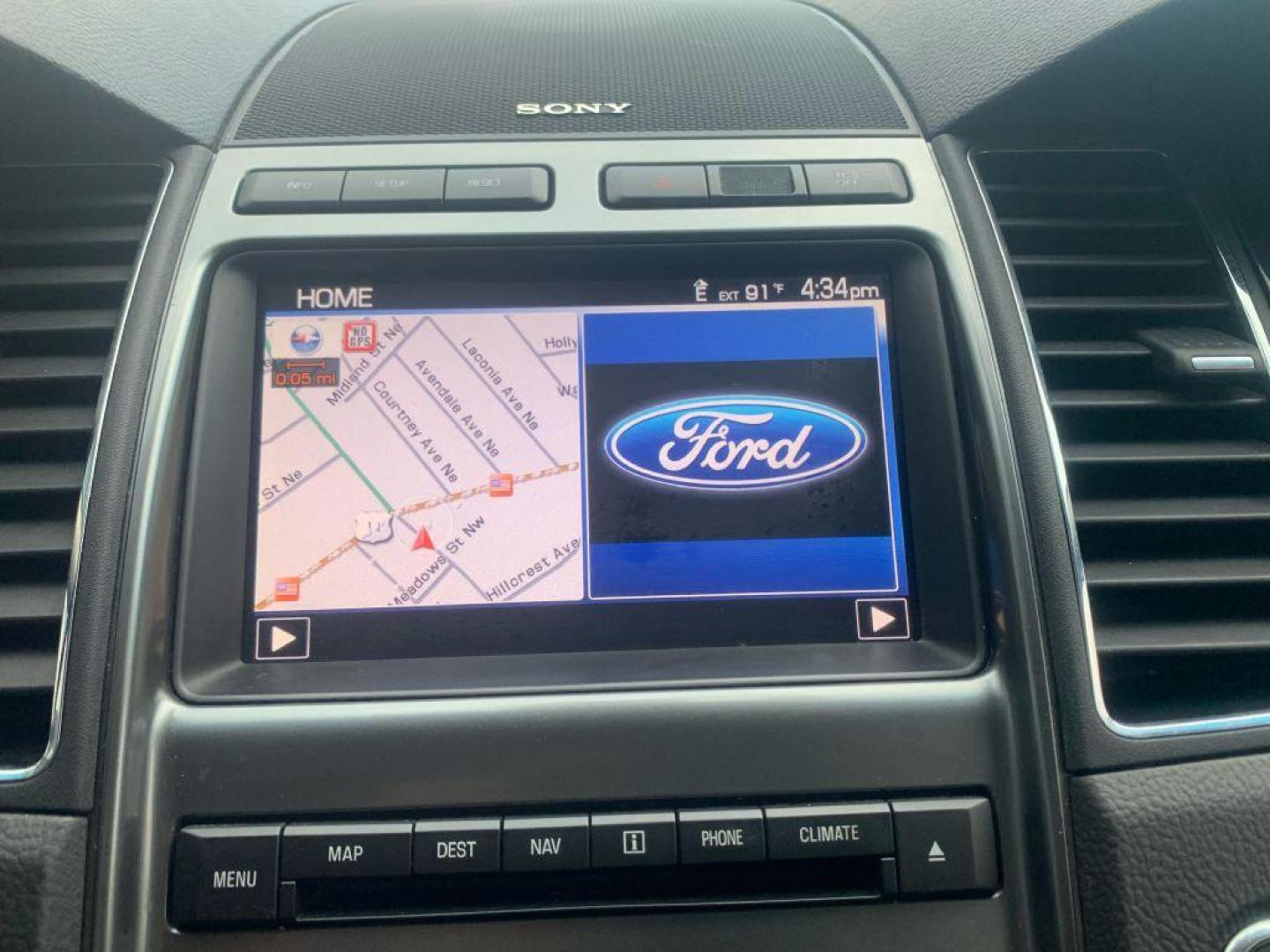2011 WHITE FORD TAURUS LIMITED (1FAHP2FW3BG) with an 3.5L engine, Automatic transmission, located at 2514 Williamson Rd NE, Roanoke, VA, 24012, (540) 265-7770, 37.294636, -79.936249 - Photo#6