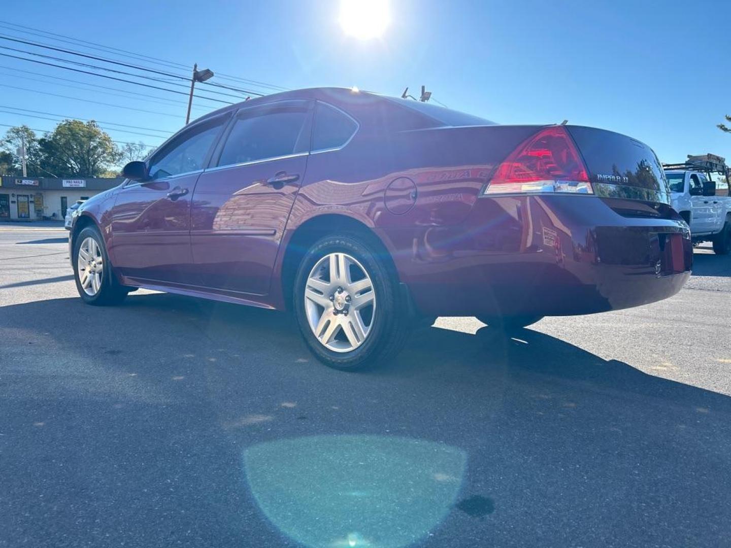 2010 RED CHEVROLET IMPALA LT (2G1WB5EK1A1) with an 3.5L engine, Automatic transmission, located at 2514 Williamson Rd NE, Roanoke, VA, 24012, (540) 265-7770, 37.294636, -79.936249 - Photo#1