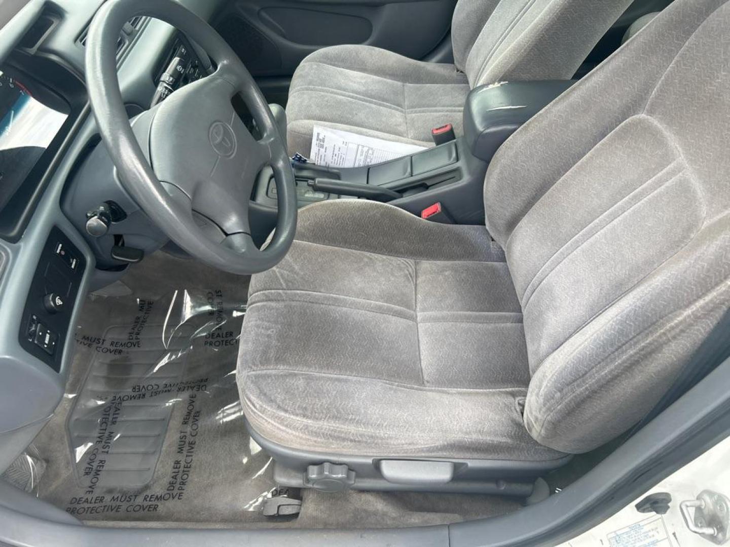 1998 WHITE TOYOTA CAMRY CE (4T1BF22K7WU) with an 3.0L engine, Automatic transmission, located at 2514 Williamson Rd NE, Roanoke, VA, 24012, (540) 265-7770, 37.294636, -79.936249 - NO CREDIT CHECK FINANCING WITH ONLY $950 DOWN PAYMENT!!!! Check out our website www.needausedvehicle.com for our No Credit Check/ In House Financing options!! No Credit Check Available!!! In House Financing Available!!! All Clean Title Vehicles (no Salvaged or flooded vehicles ever on our lot)!! - Photo#4