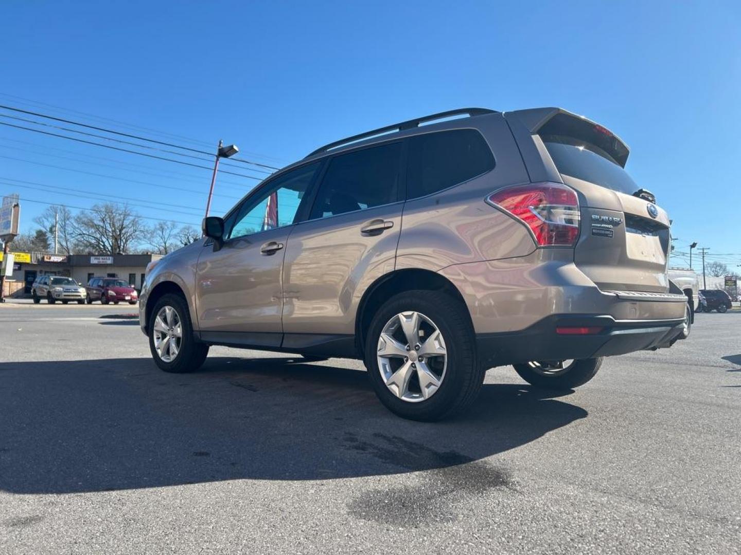2016 TAN SUBARU FORESTER 2.5I LIMITED (JF2SJAHC2GH) with an 2.5L engine, Continuously Variable transmission, located at 2514 Williamson Rd NE, Roanoke, VA, 24012, (540) 265-7770, 37.294636, -79.936249 - NO CREDIT CHECK FINANCING WITH ONLY $3000 DOWN PAYMENT!!!! Check out our website www.needausedvehicle.com for our No Credit Check/ In House Financing options!! No Credit Check Available!!! In House Financing Available!!! All Clean Title Vehicles (no Salvaged or flooded vehicles ever on our lot)! - Photo#1