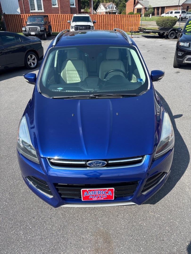 2015 BLUE FORD ESCAPE TITANIUM (1FMCU9J93FU) with an 2.0L engine, Automatic transmission, located at 2514 Williamson Rd NE, Roanoke, VA, 24012, (540) 265-7770, 37.294636, -79.936249 - NO CREDIT CHECK FINANCING WITH ONLY $2500 DOWN PAYMENT!!!! Check out our website www.needausedvehicle.com for our No Credit Check/ In House Financing options!! No Credit Check Available!!! In House Financing Available!!! All Clean Title Vehicles (no Salvaged or flooded vehicles ever on our lot)!- Photo#1