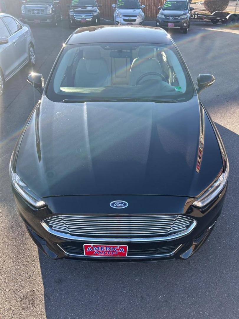 2016 BLACK FORD FUSION TITANIUM (3FA6P0K9XGR) with an 2.0L engine, Automatic transmission, located at 2514 Williamson Rd NE, Roanoke, VA, 24012, (540) 265-7770, 37.294636, -79.936249 - Photo#10