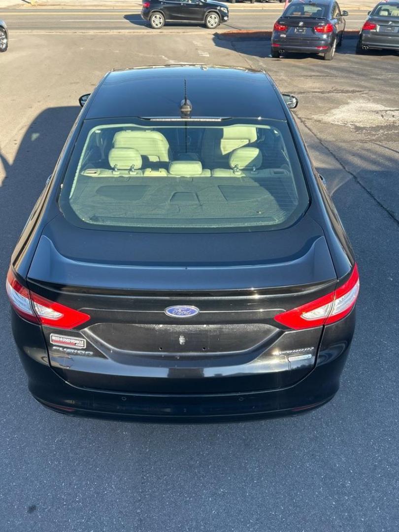 2016 BLACK FORD FUSION TITANIUM (3FA6P0K9XGR) with an 2.0L engine, Automatic transmission, located at 2514 Williamson Rd NE, Roanoke, VA, 24012, (540) 265-7770, 37.294636, -79.936249 - Photo#11