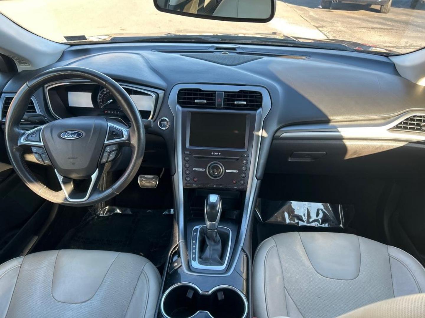 2016 BLACK FORD FUSION TITANIUM (3FA6P0K9XGR) with an 2.0L engine, Automatic transmission, located at 2514 Williamson Rd NE, Roanoke, VA, 24012, (540) 265-7770, 37.294636, -79.936249 - Photo#3