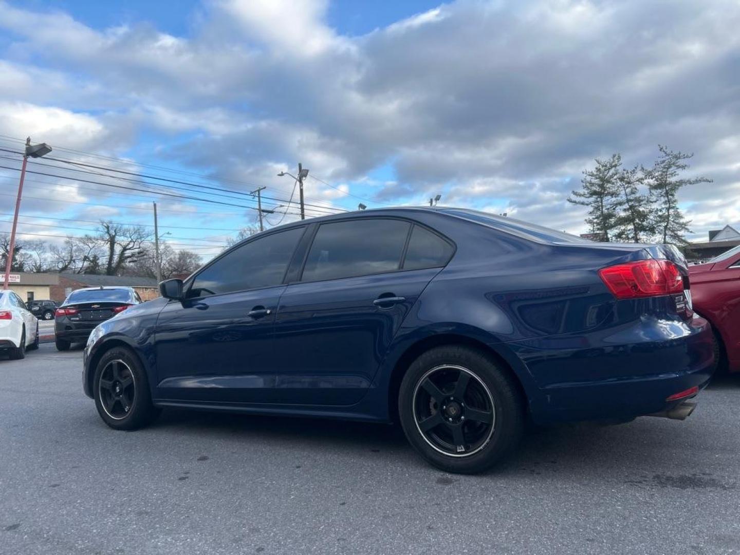 2014 BLUE VOLKSWAGEN JETTA BASE (3VW2K7AJ2EM) with an 2.0L engine, Automatic transmission, located at 2514 Williamson Rd NE, Roanoke, VA, 24012, (540) 265-7770, 37.294636, -79.936249 - NO CREDIT CHECK FINANCING WITH ONLY $1800 DOWN PAYMENT!!!! Check out our website www.needausedvehicle.com for our No Credit Check/ In House Financing options!! No Credit Check Available!!! In House Financing Available!!! All Clean Title Vehicles (no Salvaged or flooded vehicles ever on our lot)! - Photo#2