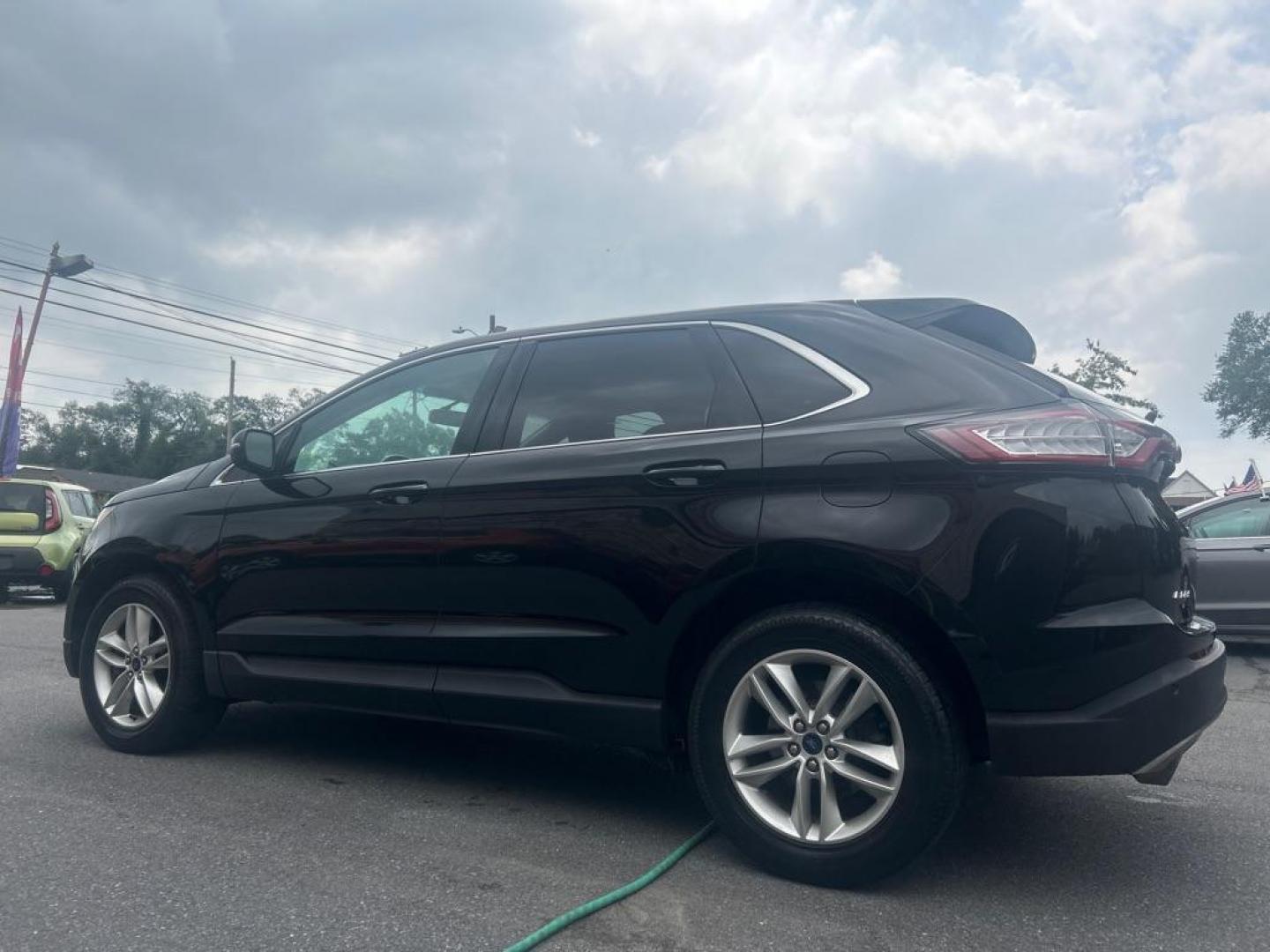 2016 BLACK FORD EDGE SEL (2FMPK4J97GB) with an 2.0L engine, Automatic transmission, located at 2514 Williamson Rd NE, Roanoke, VA, 24012, (540) 265-7770, 37.294636, -79.936249 - NO CREDIT CHECK FINANCING WITH ONLY $3500 DOWN PAYMENT!!!! Check out our website www.needausedvehicle.com for our No Credit Check/ In House Financing options!! No Credit Check Available!!! In House Financing Available!!! All Clean Title Vehicles (no Salvaged or flooded vehicles ever on our lot)! - Photo#2