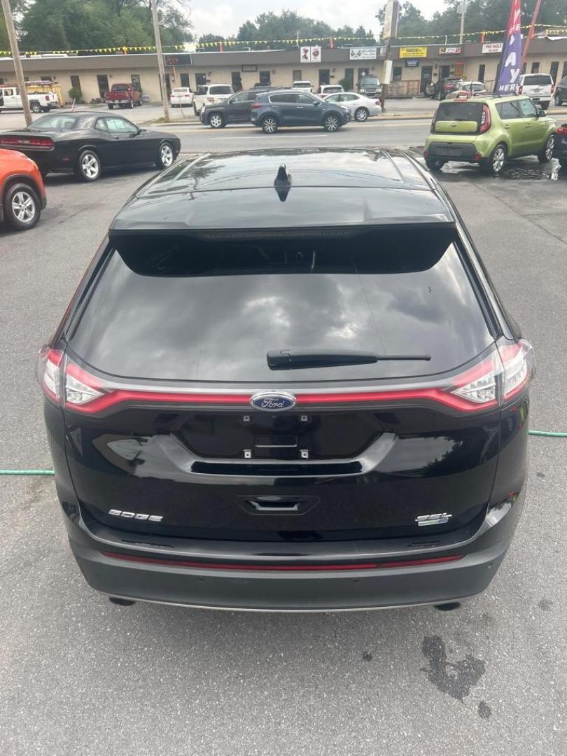 2016 BLACK FORD EDGE SEL (2FMPK4J97GB) with an 2.0L engine, Automatic transmission, located at 2514 Williamson Rd NE, Roanoke, VA, 24012, (540) 265-7770, 37.294636, -79.936249 - NO CREDIT CHECK FINANCING WITH ONLY $3500 DOWN PAYMENT!!!! Check out our website www.needausedvehicle.com for our No Credit Check/ In House Financing options!! No Credit Check Available!!! In House Financing Available!!! All Clean Title Vehicles (no Salvaged or flooded vehicles ever on our lot)! - Photo#3