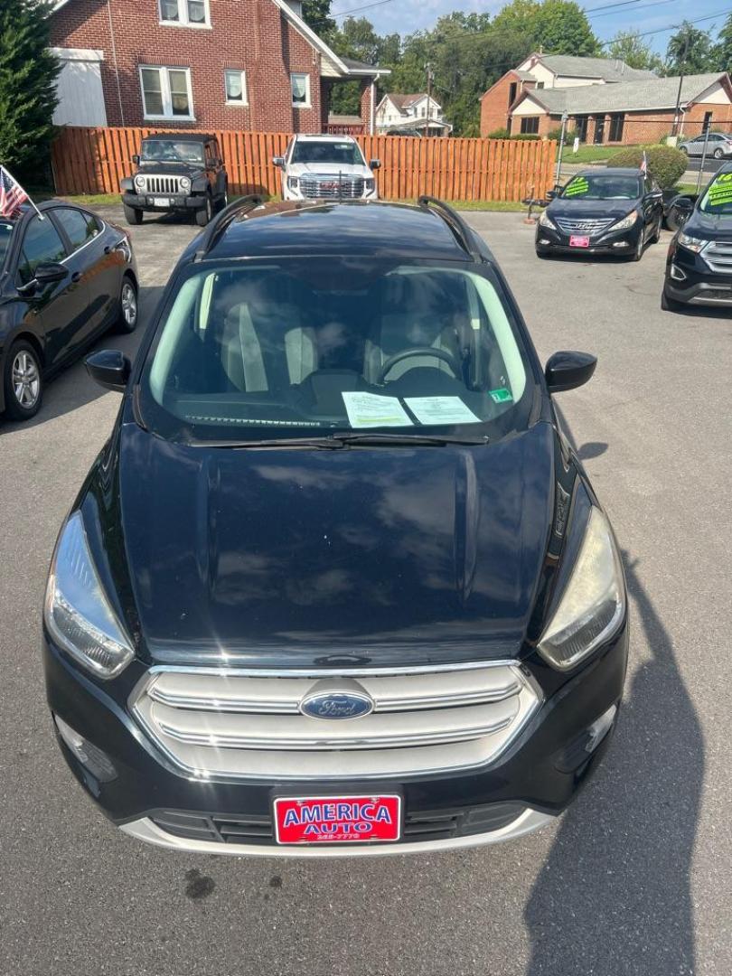 2018 BLACK FORD ESCAPE SE (1FMCU0GD1JU) with an 1.5L engine, Automatic transmission, located at 2514 Williamson Rd NE, Roanoke, VA, 24012, (540) 265-7770, 37.294636, -79.936249 - NO CREDIT CHECK FINANCING WITH ONLY $2800 DOWN PAYMENT!!!! Check out our website www.needausedvehicle.com for our No Credit Check/ In House Financing options!! No Credit Check Available!!! In House Financing Available!!! All Clean Title Vehicles (no Salvaged or flooded vehicles ever on our lot)! - Photo#1