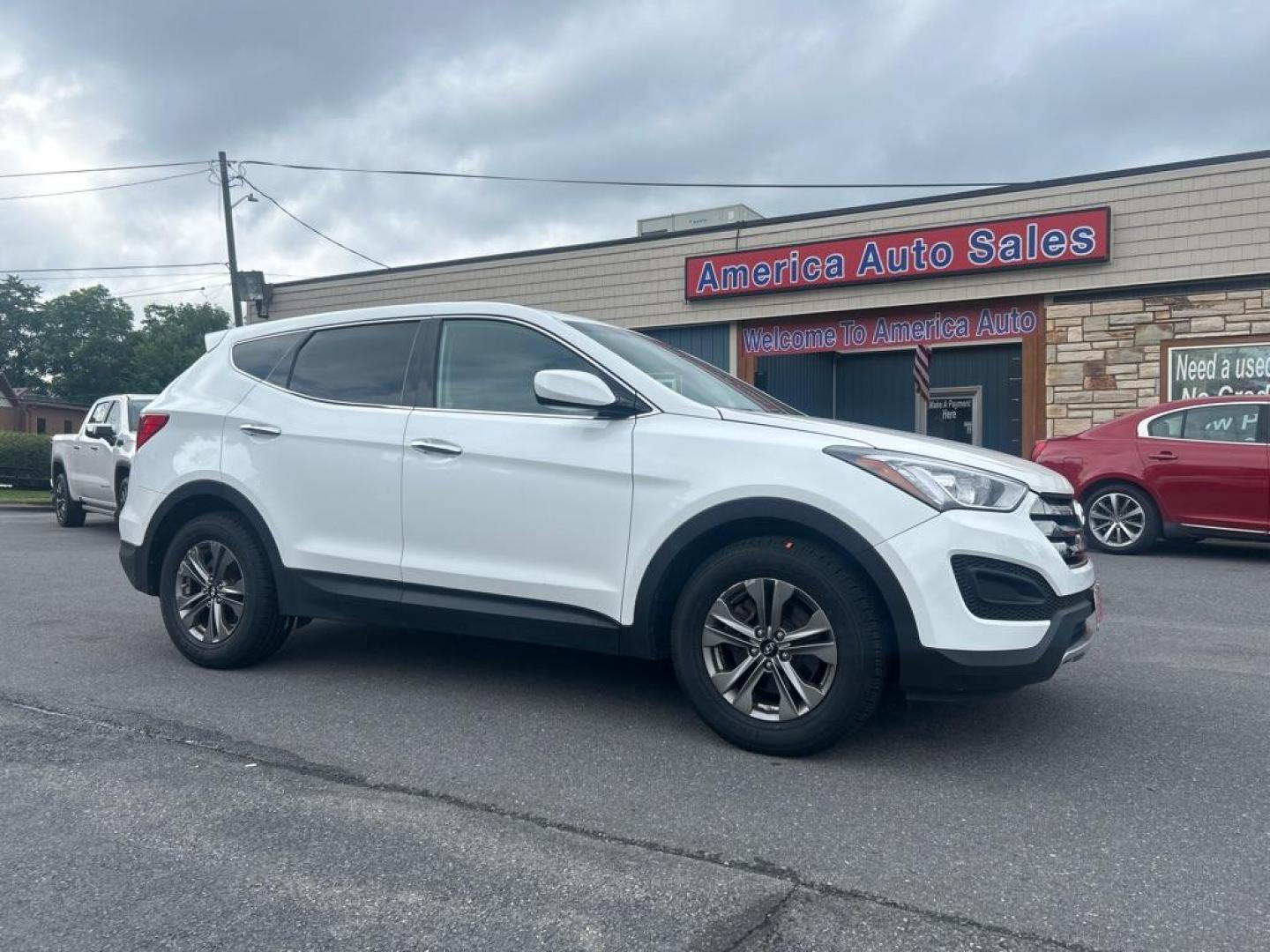 2015 WHITE HYUNDAI SANTA FE SPORT SPORT (5XYZTDLB6FG) with an 2.4L engine, Automatic transmission, located at 2514 Williamson Rd NE, Roanoke, VA, 24012, (540) 265-7770, 37.294636, -79.936249 - Photo#0