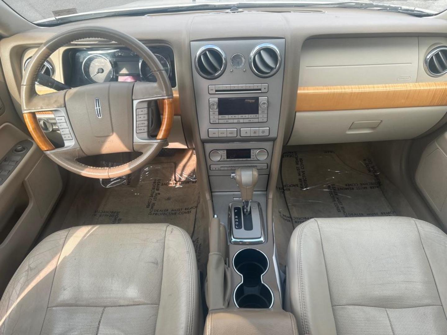 2009 WHITE LINCOLN MKZ (3LNHM28T49R) with an 3.5L engine, Automatic transmission, located at 2514 Williamson Rd NE, Roanoke, VA, 24012, (540) 265-7770, 37.294636, -79.936249 - NO CREDIT CHECK FINANCING WITH ONLY $1700 DOWN PAYMENT!!!! Check out our website www.needausedvehicle.com for our No Credit Check/ In House Financing options!! No Credit Check Available!!! In House Financing Available!!! All Clean Title Vehicles (no Salvaged or flooded vehicles ever on our lot)! - Photo#5