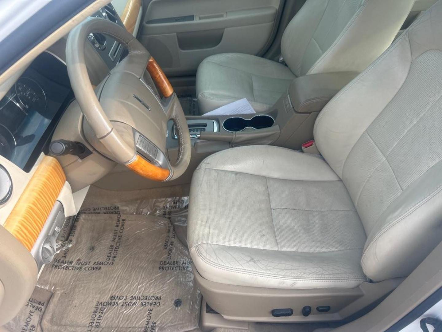 2009 WHITE LINCOLN MKZ (3LNHM28T49R) with an 3.5L engine, Automatic transmission, located at 2514 Williamson Rd NE, Roanoke, VA, 24012, (540) 265-7770, 37.294636, -79.936249 - NO CREDIT CHECK FINANCING WITH ONLY $1700 DOWN PAYMENT!!!! Check out our website www.needausedvehicle.com for our No Credit Check/ In House Financing options!! No Credit Check Available!!! In House Financing Available!!! All Clean Title Vehicles (no Salvaged or flooded vehicles ever on our lot)! - Photo#6