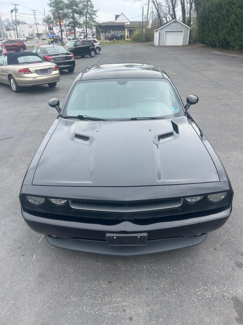 2013 BLACK DODGE CHALLENGER SXT (2C3CDYAG7DH) with an 3.6L engine, Automatic transmission, located at 2514 Williamson Rd NE, Roanoke, VA, 24012, (540) 265-7770, 37.294636, -79.936249 - NO CREDIT CHECK FINANCING WITH ONLY $3800 DOWN PAYMENT!!!! Check out our website www.needausedvehicle.com for our No Credit Check/ In House Financing options!! No Credit Check Available!!! In House Financing Available!!! All Clean Title Vehicles (no Salvaged or flooded vehicles ever on our lot)! - Photo#1