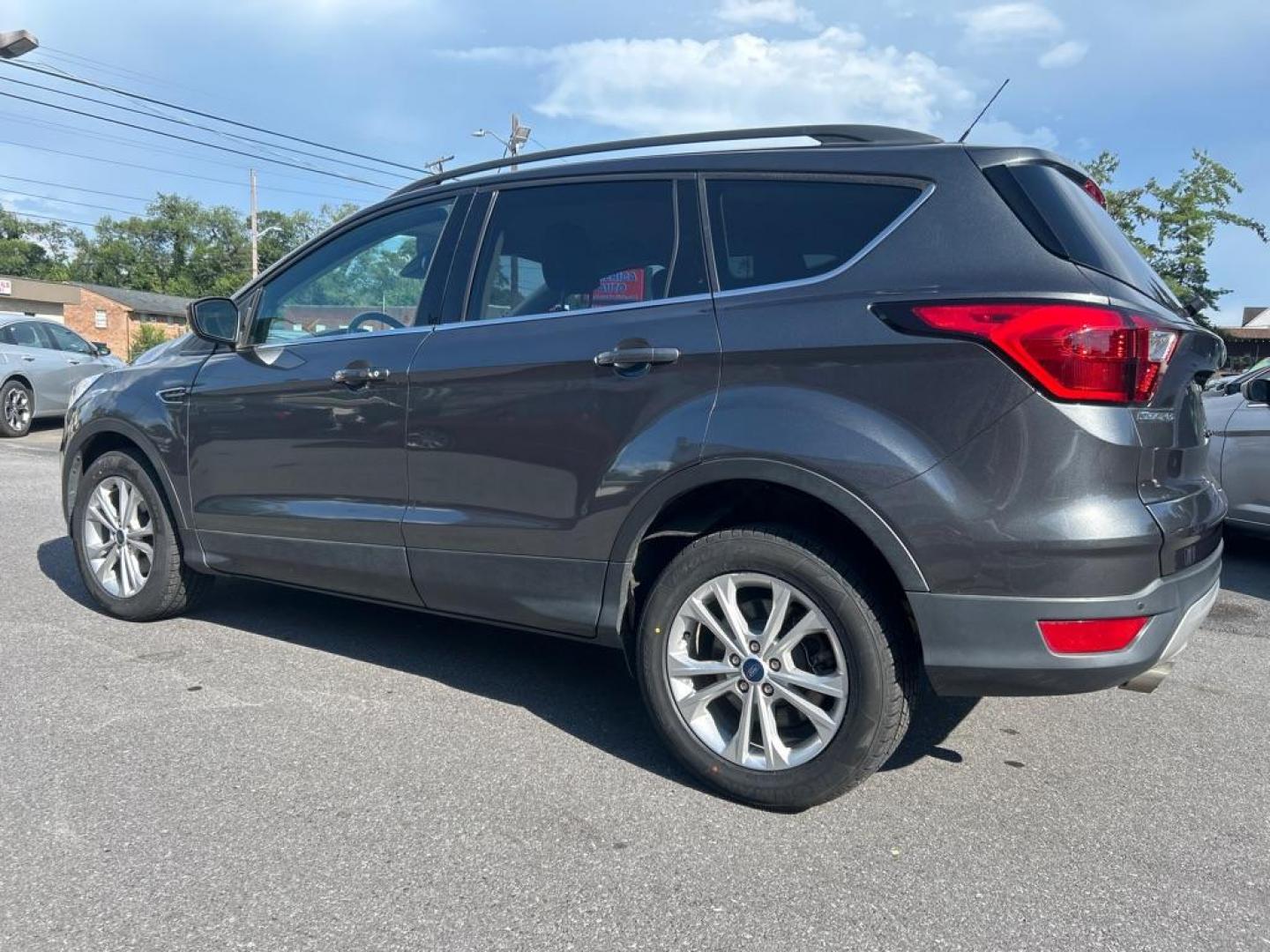 2019 GRAY FORD ESCAPE SEL (1FMCU0HD0KU) with an 1.5L engine, Automatic transmission, located at 2514 Williamson Rd NE, Roanoke, VA, 24012, (540) 265-7770, 37.294636, -79.936249 - NO CREDIT CHECK FINANCING WITH ONLY $3300 DOWN PAYMENT!!!! Check out our website www.needausedvehicle.com for our No Credit Check/ In House Financing options!! No Credit Check Available!!! In House Financing Available!!! All Clean Title Vehicles (no Salvaged or flooded vehicles ever on our lot)! - Photo#2