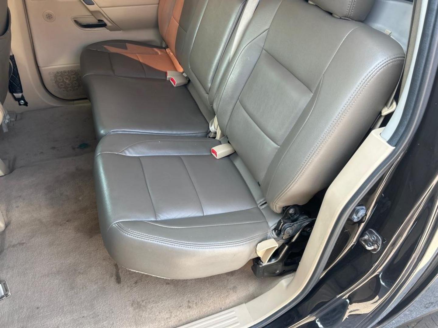 2014 BROWN NISSAN TITAN S (1N6BA0EK9EN) with an 5.6L engine, Automatic transmission, located at 2514 Williamson Rd NE, Roanoke, VA, 24012, (540) 265-7770, 37.294636, -79.936249 - Photo#2