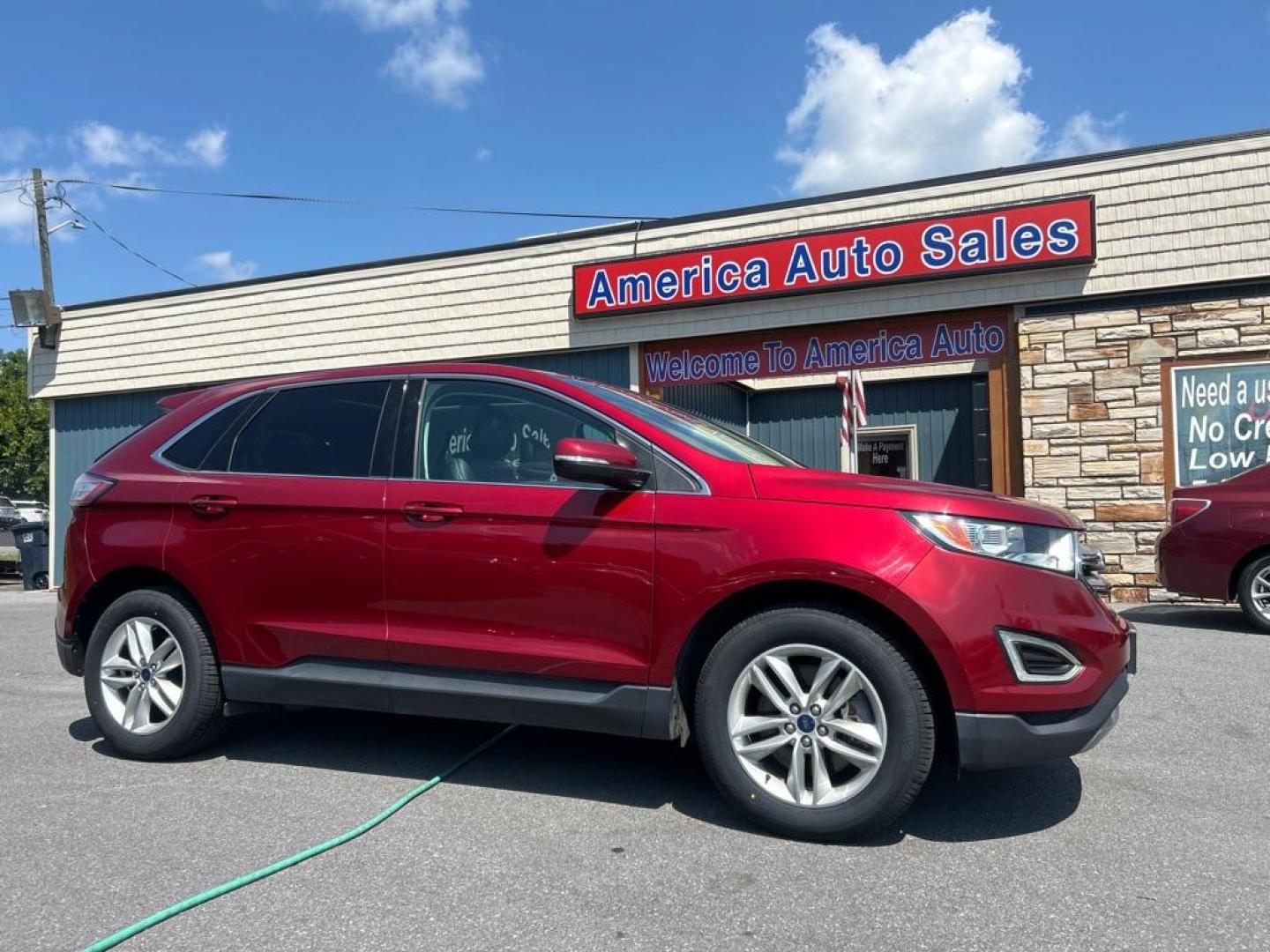 2016 RED FORD EDGE SEL (2FMPK4J93GB) with an 2.0L engine, Automatic transmission, located at 2514 Williamson Rd NE, Roanoke, VA, 24012, (540) 265-7770, 37.294636, -79.936249 - Photo#0