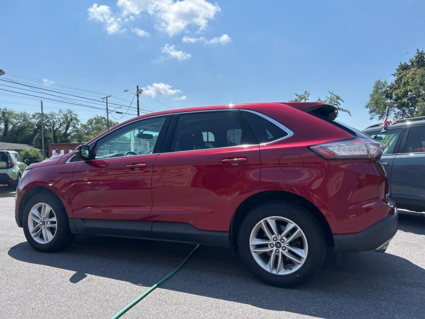 2016 RED FORD EDGE SEL (2FMPK4J93GB) with an 2.0L engine, Automatic transmission, located at 2514 Williamson Rd NE, Roanoke, VA, 24012, (540) 265-7770, 37.294636, -79.936249 - Photo#1