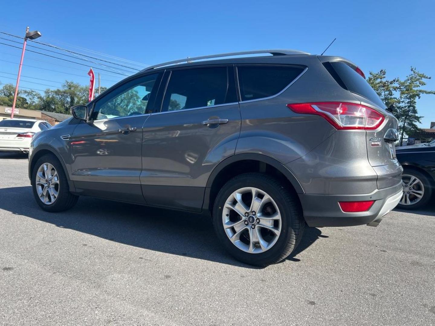 2014 GRAY FORD ESCAPE TITANIUM (1FMCU9JX4EU) with an 1.6L engine, Automatic transmission, located at 2514 Williamson Rd NE, Roanoke, VA, 24012, (540) 265-7770, 37.294636, -79.936249 - NO CREDIT CHECK FINANCING WITH ONLY $3500 DOWN PAYMENT!!!! Check out our website www.needausedvehicle.com for our No Credit Check/ In House Financing options!! No Credit Check Available!!! In House Financing Available!!! All Clean Title Vehicles (no Salvaged or flooded vehicles ever on our lot)! - Photo#2