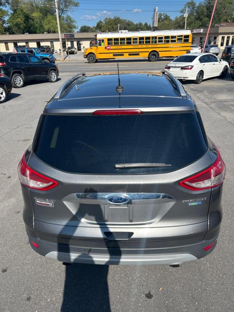 2014 GRAY FORD ESCAPE TITANIUM (1FMCU9JX4EU) with an 1.6L engine, Automatic transmission, located at 2514 Williamson Rd NE, Roanoke, VA, 24012, (540) 265-7770, 37.294636, -79.936249 - NO CREDIT CHECK FINANCING WITH ONLY $3500 DOWN PAYMENT!!!! Check out our website www.needausedvehicle.com for our No Credit Check/ In House Financing options!! No Credit Check Available!!! In House Financing Available!!! All Clean Title Vehicles (no Salvaged or flooded vehicles ever on our lot)! - Photo#3