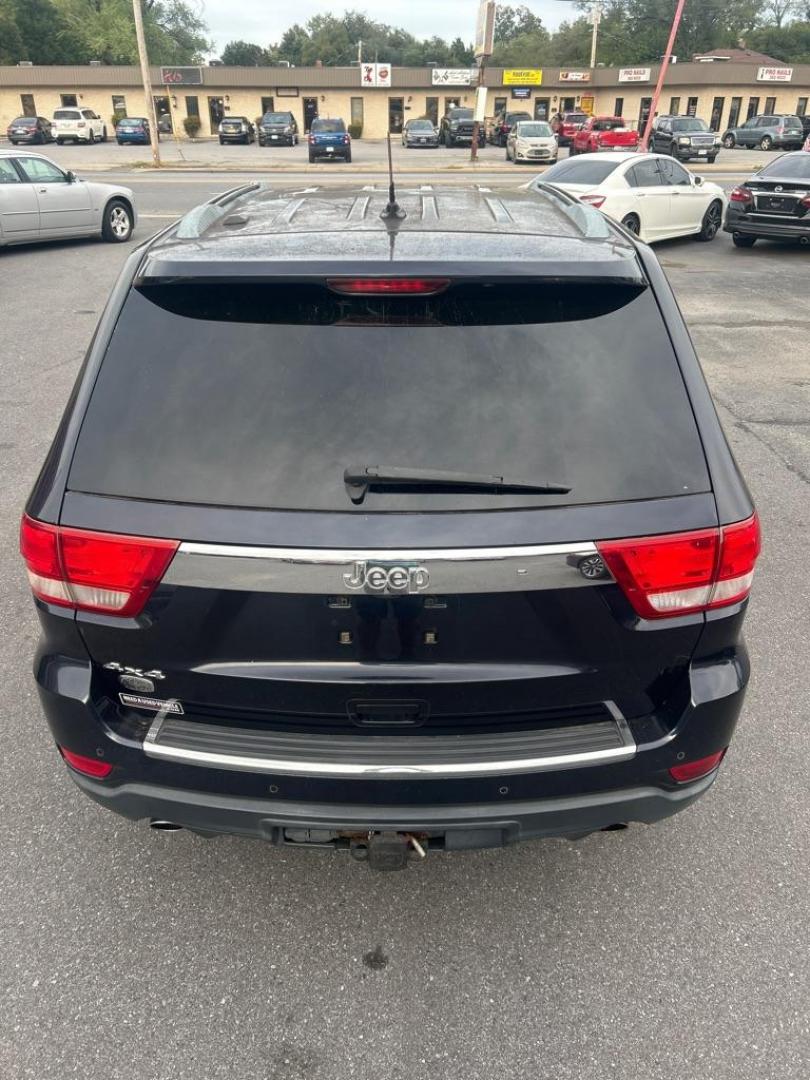 2011 BLUE JEEP GRAND CHEROKEE OVERLAND (1J4RR6GT4BC) with an 5.7L engine, Automatic transmission, located at 2514 Williamson Rd NE, Roanoke, VA, 24012, (540) 265-7770, 37.294636, -79.936249 - Photo#3