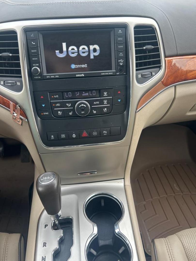 2011 BLUE JEEP GRAND CHEROKEE OVERLAND (1J4RR6GT4BC) with an 5.7L engine, Automatic transmission, located at 2514 Williamson Rd NE, Roanoke, VA, 24012, (540) 265-7770, 37.294636, -79.936249 - Photo#10