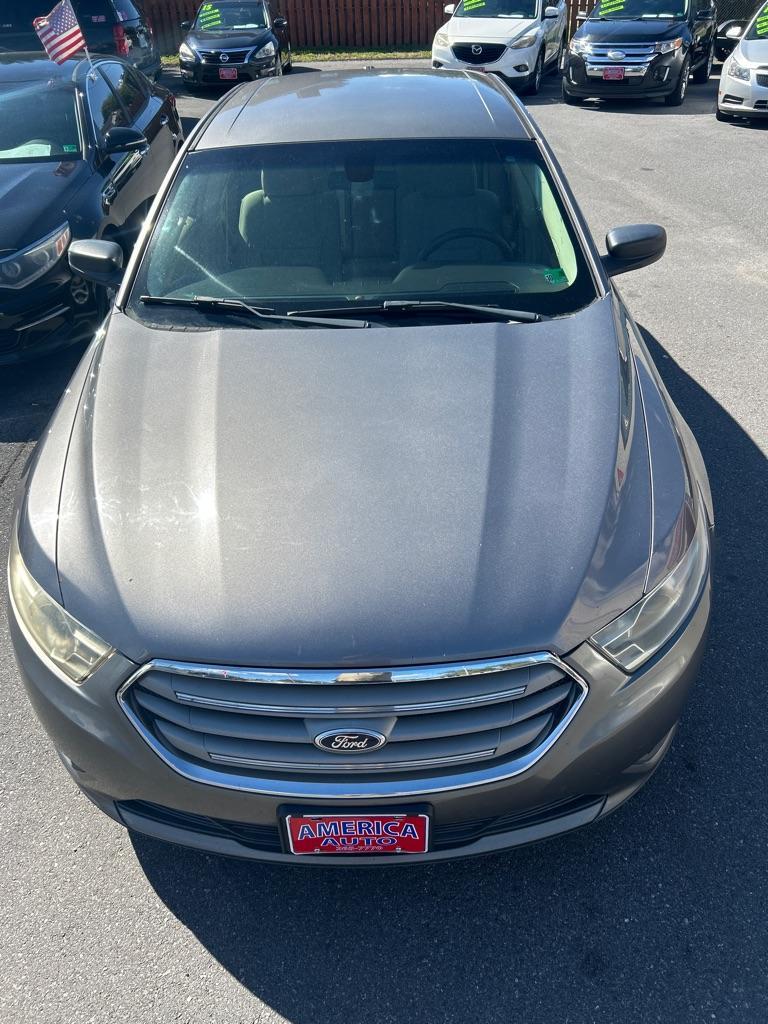2013 GRAY FORD TAURUS SE (1FAHP2D99DG) with an 2.0L engine, Automatic transmission, located at 2514 Williamson Rd NE, Roanoke, VA, 24012, (540) 265-7770, 37.294636, -79.936249 - NO CREDIT CHECK FINANCING WITH ONLY $2000 DOWN PAYMENT!!!! Check out our website www.needausedvehicle.com for our No Credit Check/ In House Financing options!! No Credit Check Available!!! In House Financing Available!!! All Clean Title Vehicles (no Salvaged or flooded vehicles ever on our lot)! - Photo#1