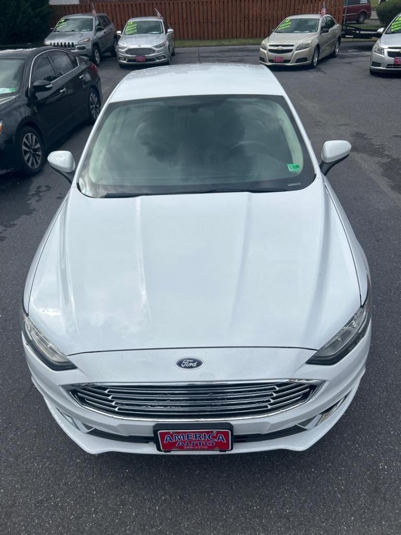 2018 WHITE FORD FUSION SE (3FA6P0HD1JR) with an 1.5L engine, Automatic transmission, located at 2514 Williamson Rd NE, Roanoke, VA, 24012, (540) 265-7770, 37.294636, -79.936249 - NO CREDIT CHECK FINANCING WITH ONLY $3500 DOWN PAYMENT!!!! Check out our website www.needausedvehicle.com for our No Credit Check/ In House Financing options!! No Credit Check Available!!! In House Financing Available!!! All Clean Title Vehicles (no Salvaged or flooded vehicles ever on our lot)! - Photo#10